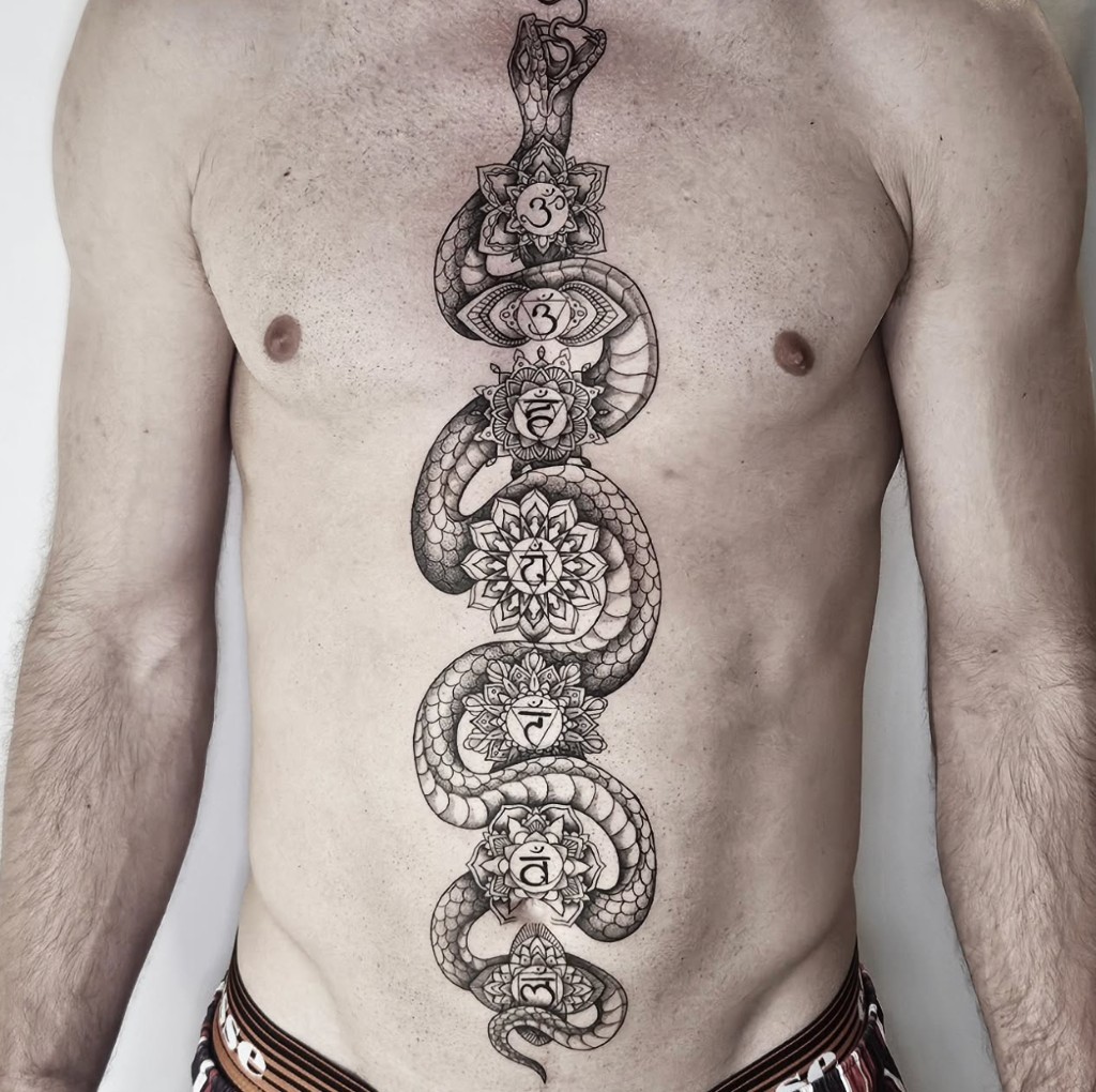 Tattoo work — snake and chakras