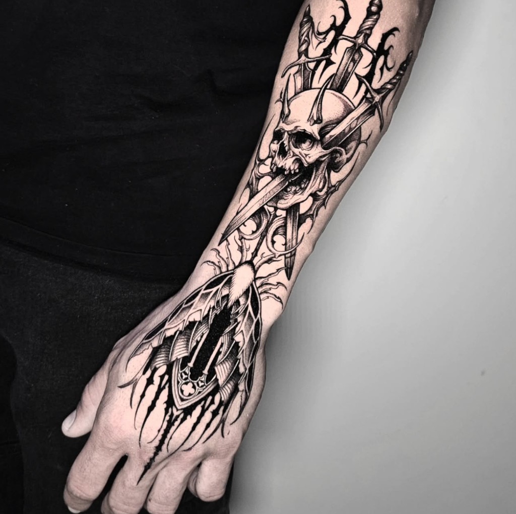 Tattoo work — skull and sword sleeve