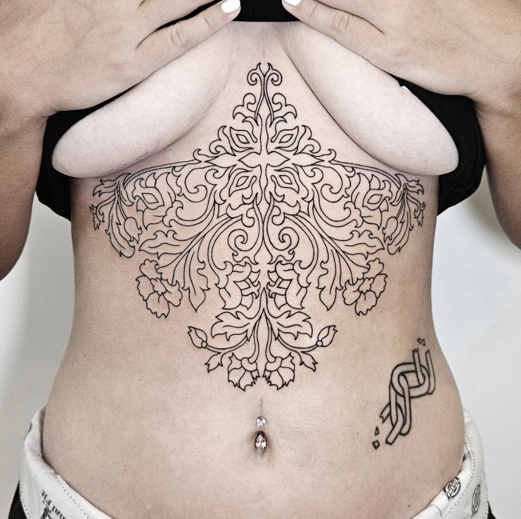 Tattoo work — ornamental sternum